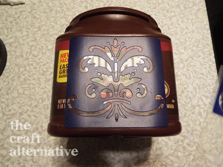 How to Make a Gift Box Using a Plastic Coffee Can apply stencil