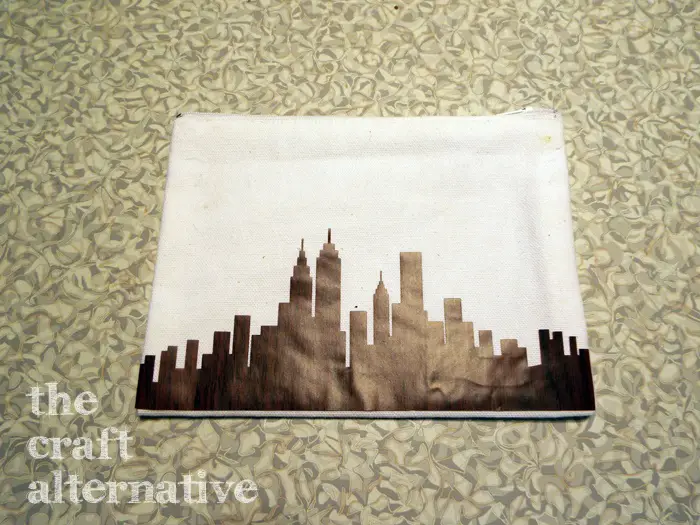 Ink Dye on a Canvas Pouch add stencil or vinyl design to mark off canvas